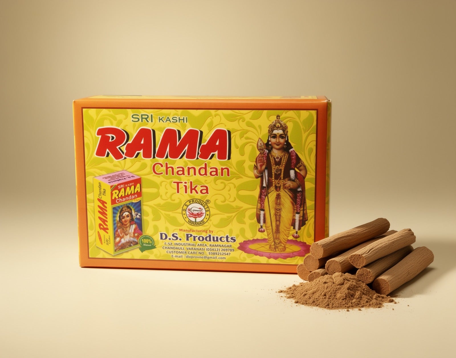 Box of Rama Chandan Tika with sticks and powder on a beige background