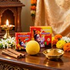 Kashi Ashtagandha Om Tika with a yellow ball, bowl of powder, and lit candle on a wooden surface.