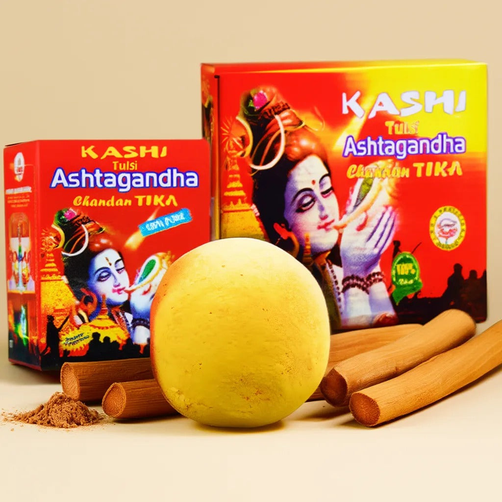 Kashi Tulsi Ashtagandha Chandan Tika with a yellow ball and sticks on a beige background