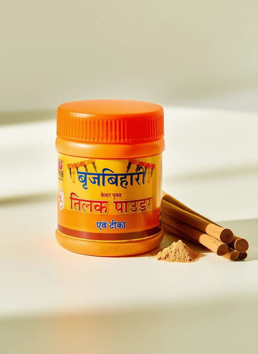 Jar of Bhrigu Biharli Tilak Powder with cinnamon sticks on a light background