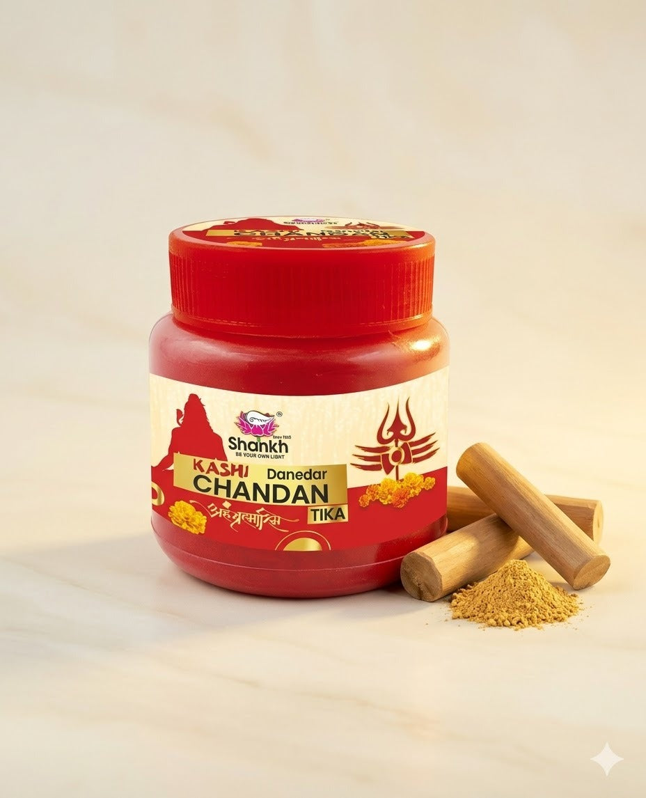 Jar of Kashi Chandan Tika with wooden sticks on a light background
