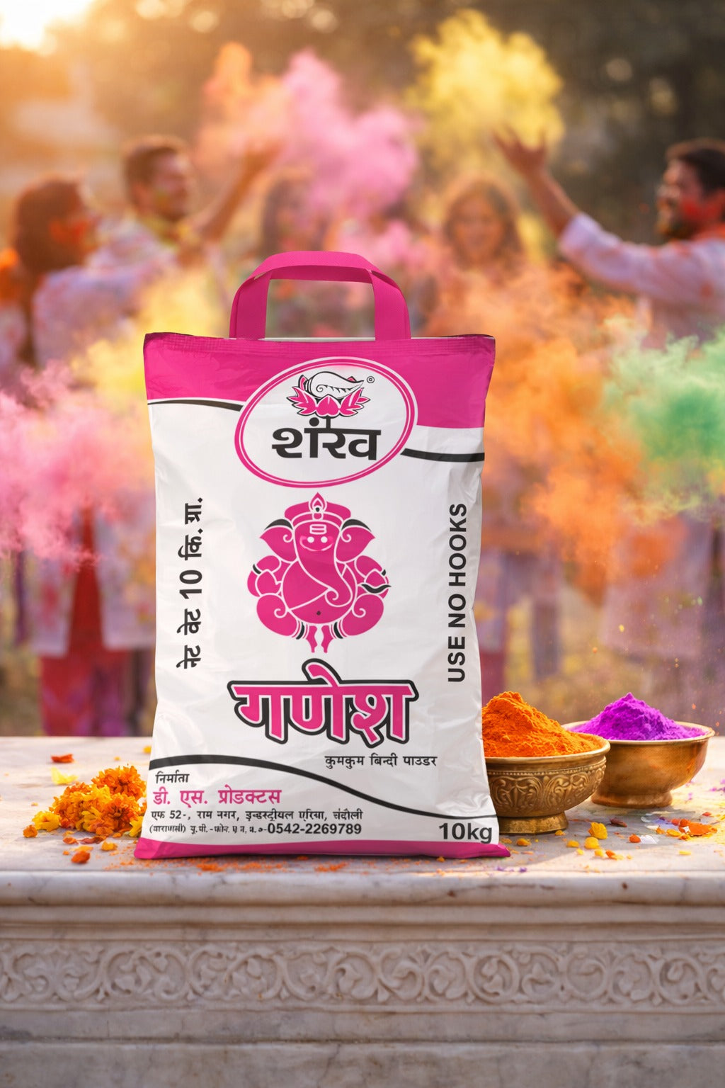 Shree Ganesh powder bag with colorful powder around on a festive background