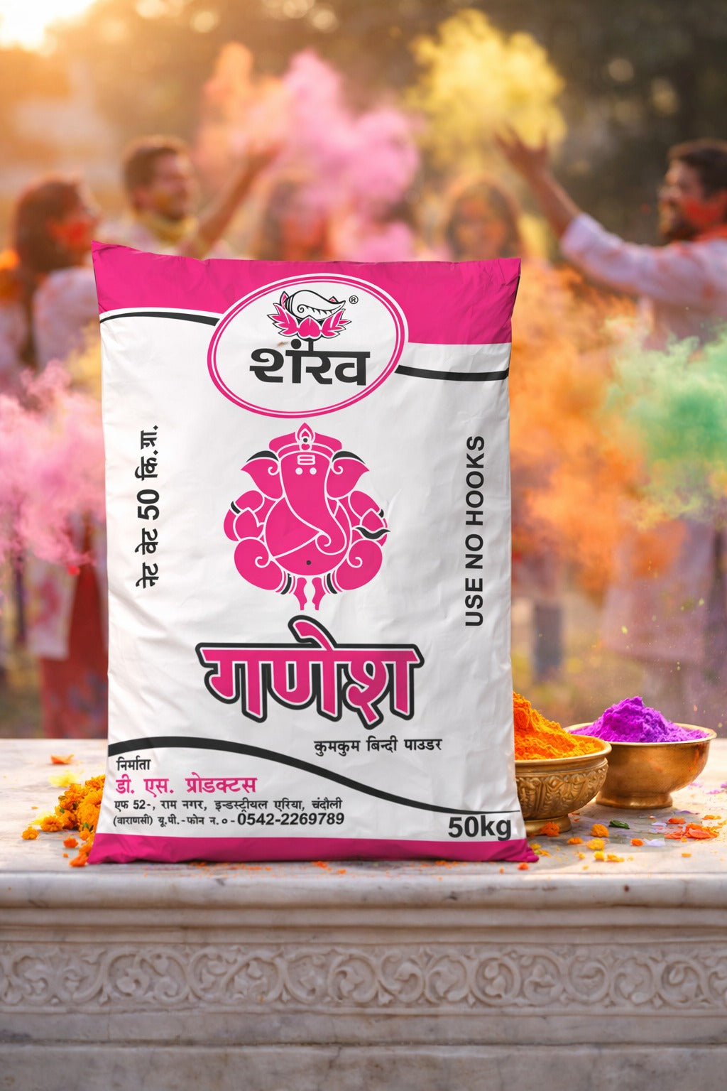 Bag of Shani Ganesh color powder with people celebrating Holi in the background