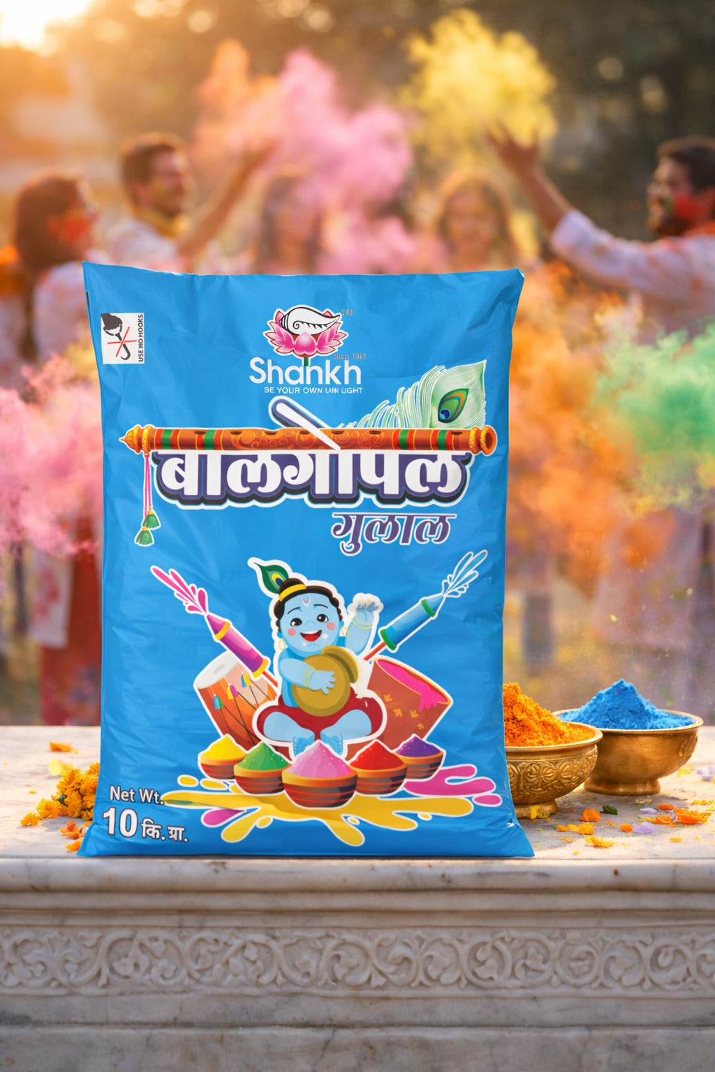 Shankh Holi Color Powder packaging with people celebrating Holi in the background