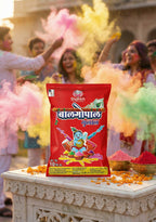 Red packet with colorful powder and people celebrating Holi in the background
