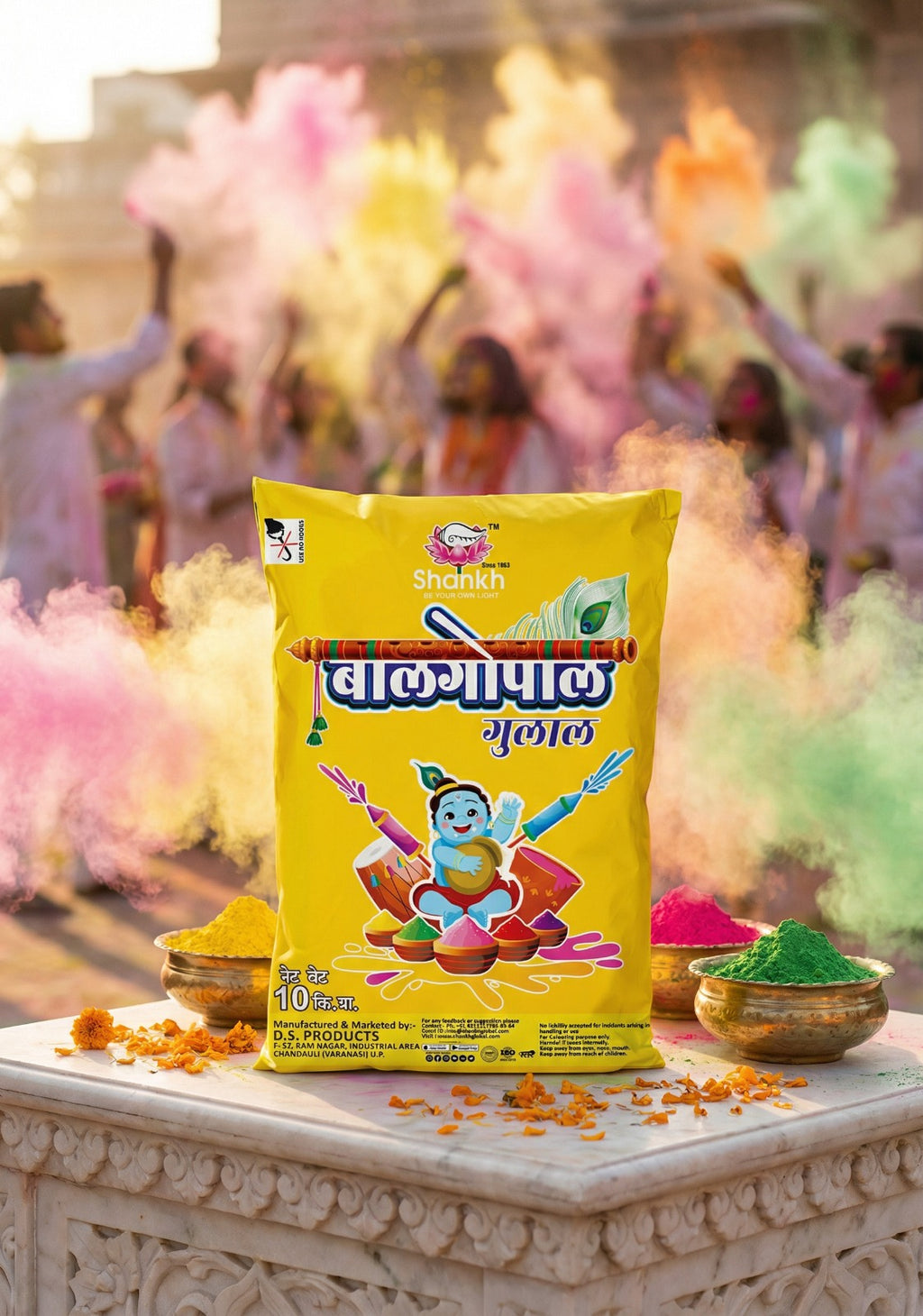Packaged product with colorful powder on a decorative platform during Holi celebrations.