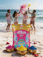 Gulal powder packaging with people celebrating Holi on a beach