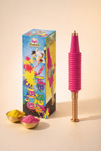 Colorful Holi powder with a pink and gold stick and packaging on a beige background