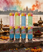 Four 'Colour Blaster' products on a stone ledge with a scenic background of water and buildings.