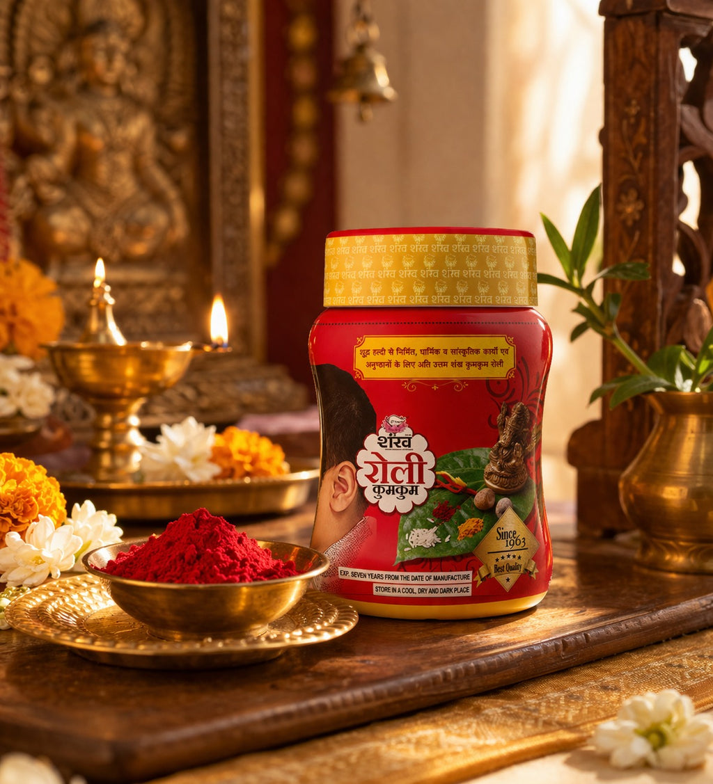 Red container with gold lid on a wooden surface with decorative elements