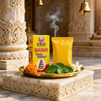 Pooja Keshari packaging with flowers and leaves on a decorative platform