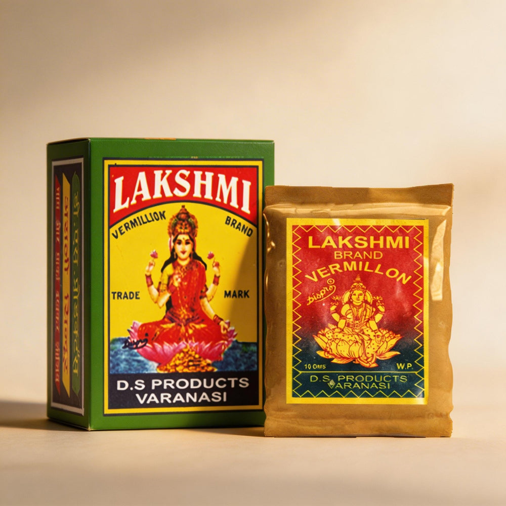 Lakshmi Brand Vermillon packaging with a woman figure on a beige background