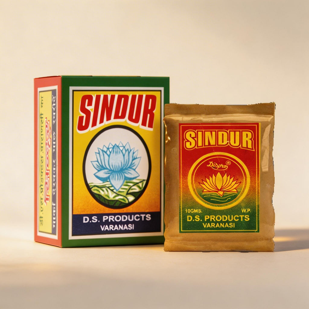 Sindur packaging with box and packet on a beige background