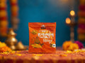 Orange packet with text and graphics on a decorative background