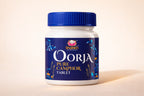 Jar of Oorja Pure Camphor Tablets with blue lid on a beige background
