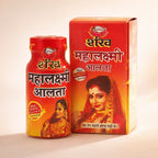 Shankh Mahalakshmi Alat bottle and box on a beige background