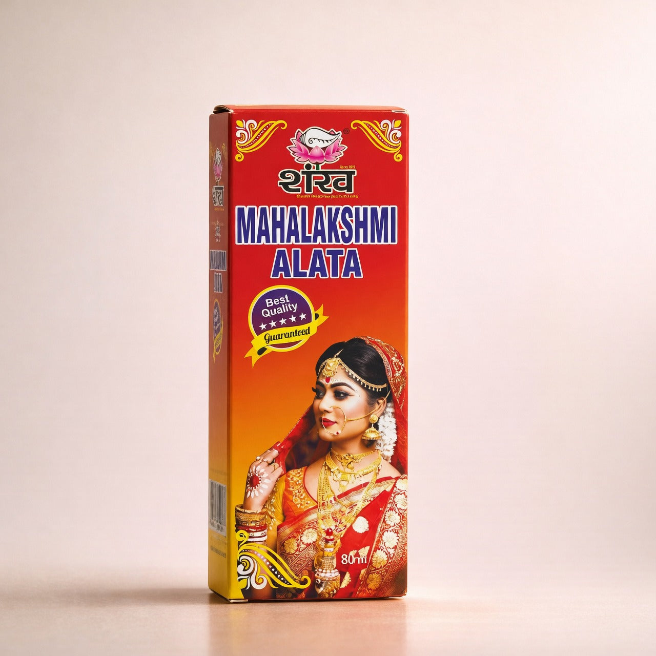 Box of Mahalakshmi Alata with a decorative design on a beige background