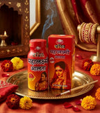 Two bottles of 'Dabur' products on a decorative tray with flowers and jewelry in the background.