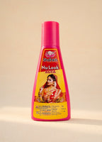 Shampoo bottle with a colorful label featuring a woman and text on a beige background