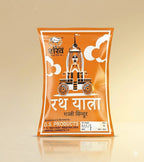 Orange packaging with white text and graphics on a beige background