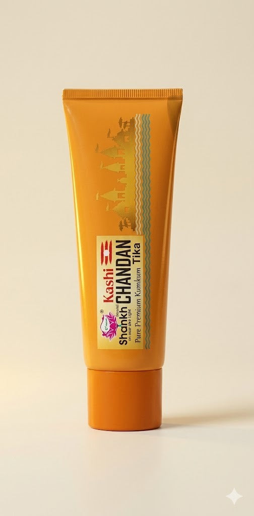 Keshi Parichay Chandan Tika tube on a beige background