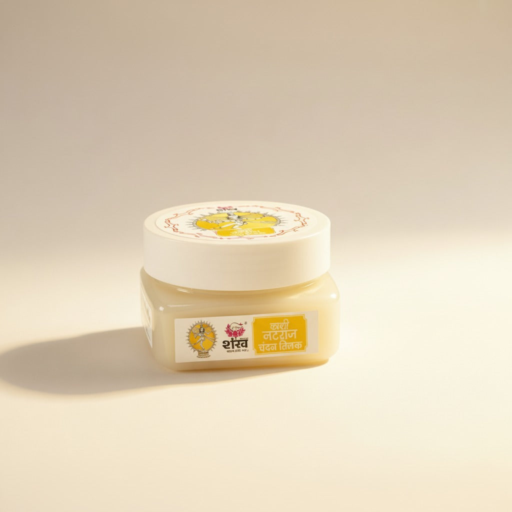 Jar of cream with a label on a beige background