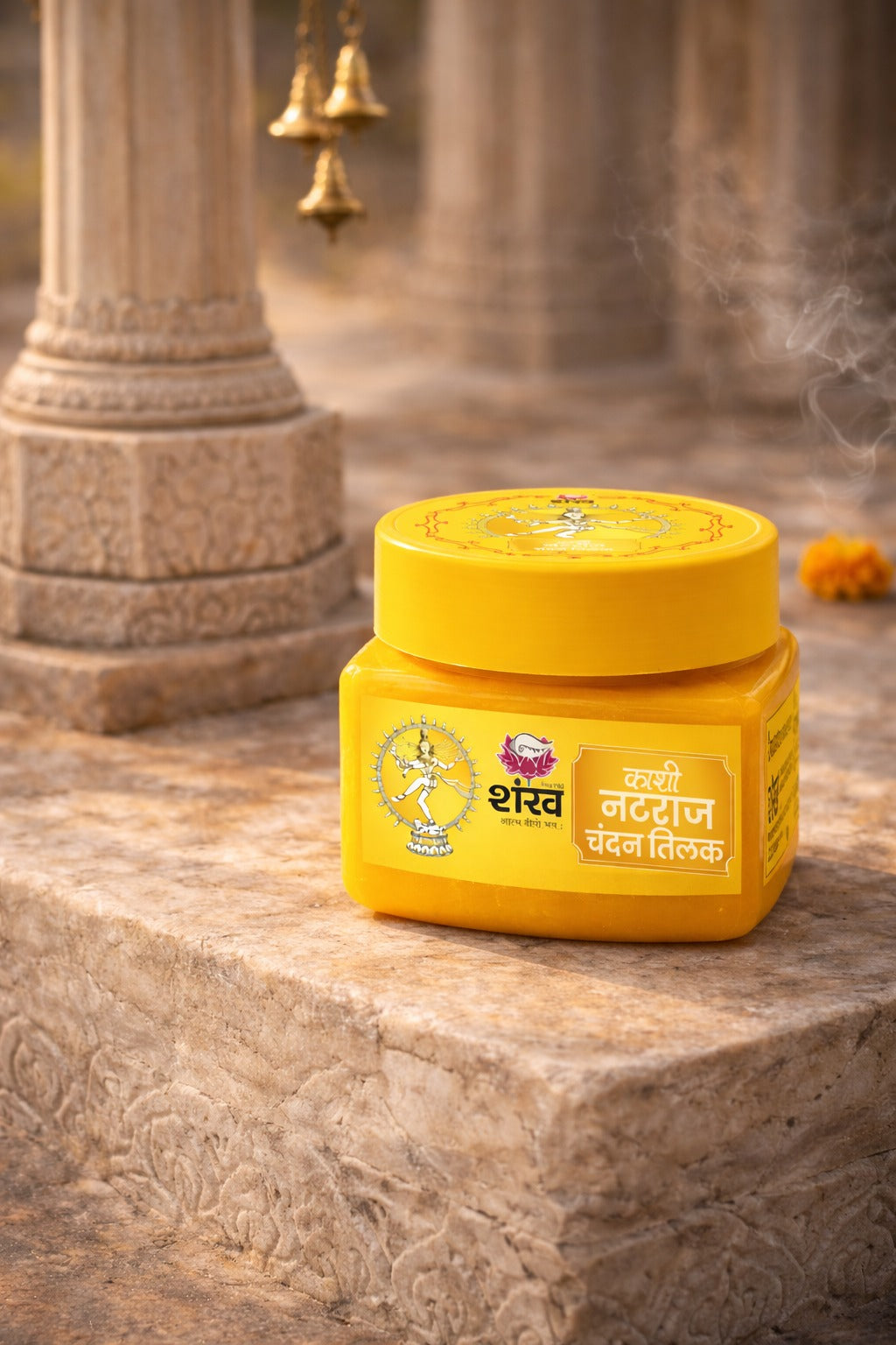 Yellow jar with a label on a stone surface with architectural elements in the background