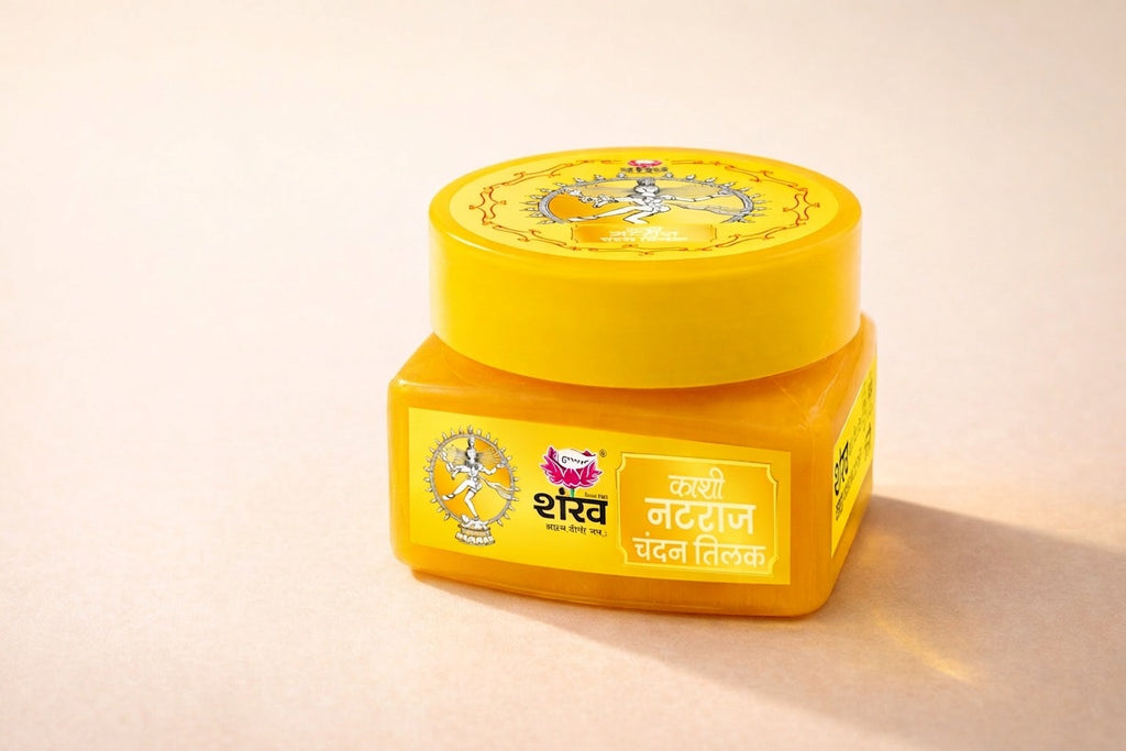 Yellow jar with a lid on a beige background